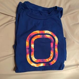 This shirt is made by Overtime ,a basketball company.